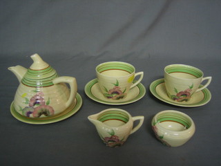 An Art Deco 8 piece Wilkinson Ltd tea service with green banding and floral decoration comprising teapot 4", tea plate 5 1/2", 2 cups and 2 saucers (1 cup chipped), milk jug 2", sugar bowl 1"