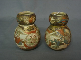 A pair of 19th Century Japanese Satsuma double gourd shaped vases decorated court scenes (lids missing)