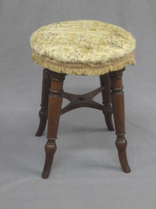 A William IV mahogany piano stool with upholstered seat