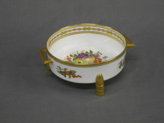 A 19th Century Spode Copeland china circular twin handled porcelain dish with gilt banding and floral decoration signed F Adams, raised on 3 feet, 8"