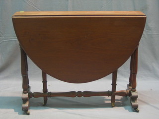 An oval Victorian mahogany Sutherland table 34"