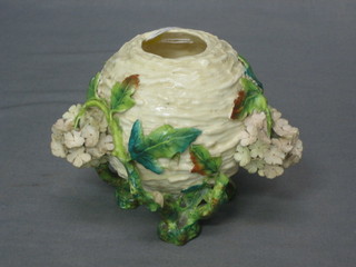 A Victorian floral encrusted oil lamp base 5" (some chips)
