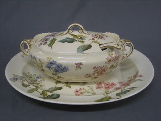 A George Jones oval floral patterned meat plate 20" and an oval twin handled soup tureen and ladle