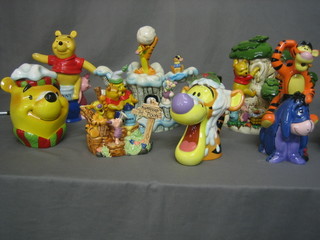 8 various Winnie The Pooh Teapots