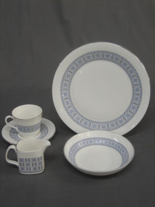 A 38 piece Royal Doulton Counterpoint tea/dinner service comprising 8 dinner plates 10", 8 side plates 7", 7 pudding bowls 7", cream jug, sugar bowl, 7 saucers and 7 cups (1 cracked, silver rubbed and with contact marks)