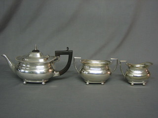 A Georgian style oval 3 piece silver plated tea service comprising teapot, twin handled sugar bowl and cream jug