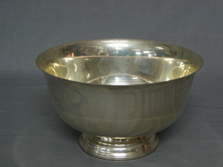 A circular Sterling silver bowl, the base marked Sterling by Fina 18 ozs