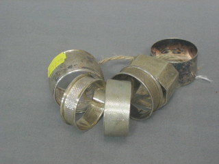5 various silver napkin rings 3 ozs and 1 other