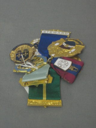 5 various gilt metal and enamel charity jewels