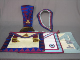 A quantity of various Masonic regalia comprising a Past Master's apron, a Mark Master Masons apron, a Royal Arch Principals apron and sash and a Royal Arch collar