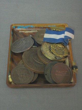 A Masonic peace jewel, a Primrose League jewel, a bronze National Rifle Association medal, 2 bronze Oxford University medallions and 7 other medallions
