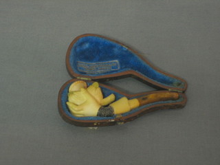 A 19th Century carved Meerschaum cheroot holder in the form of a hand 3"