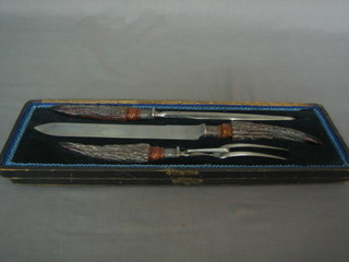A Victorian 3 piece carving set with stag horn handle by Walker and Hall, cased