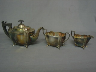 A Georgian style silver plated oval 3 piece tea service comprising teapot, twin handled sugar bowl, milk jug and a pair of sugar tongs