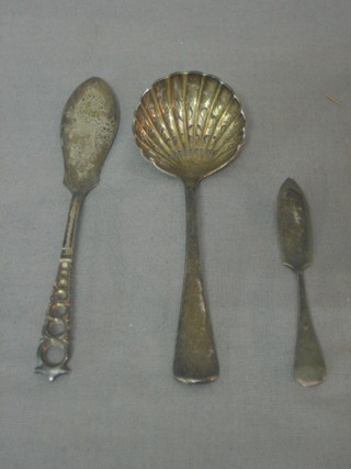  A Victorian silver sifter spoon, London 1898, a silver fish knife and a small butter knife, 2 ozs