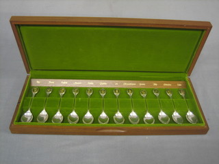 A set of 12 Royal Horticultural Society silver gilt teaspoons, 9ozs, cased