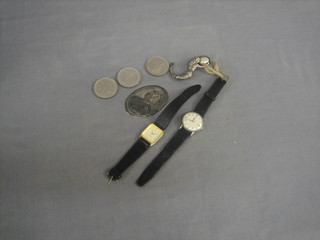 A gentleman's Omega Turler wristwatch contained in a chrome case, an Accurist wristwatch, 4 crowns and a brooch
