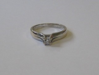 An 18ct white gold solitaire dress/engagement ring set a diamond 