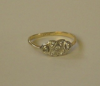 An 18ct yellow gold dress ring set diamonds