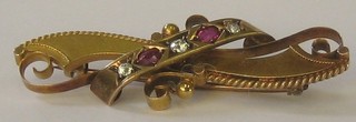 A Victorian 15ct gold bar brooch set rubies and diamonds