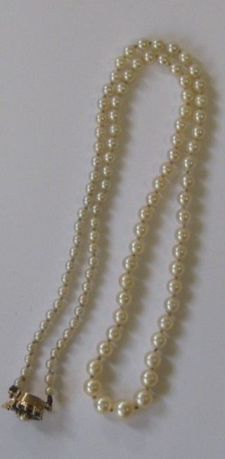 A rope of "pearls" with 15ct gold clasp