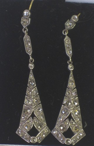 A pair of Art Deco style pierced diamond drop earrings, set numerous diamonds, approx 1.50ct