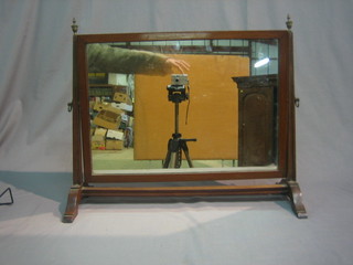 A 19th Century rectangular plate dressing table mirror contained in a mahogany swing frame 18"