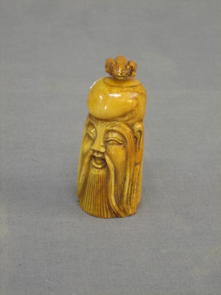 A carved reproduction bone snuff bottle 3"