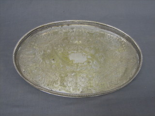 An oval silver plated galleried tea tray 15"