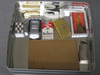 A collection of various vintage lighters