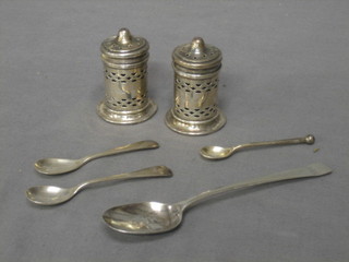 A pair of circular pierced silver salts, a Georgian silver teaspoon, and 3 condiment spoons