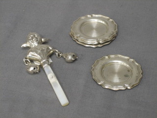 6 miniature silver platters 1 1/2" and a silver rattle