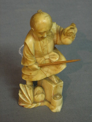 A carved ivory figure of a standing sage 4" (cracked)