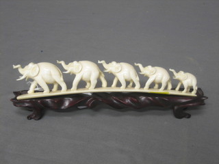 A bridge of 5 ivory elephants