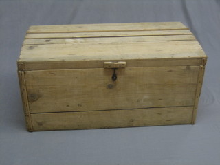 A pine trunk with hinged lid and iron drop handles 39"