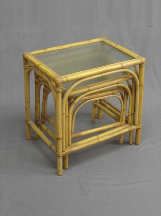 A nest of 3 rectangular bamboo interfitting coffee tables 23"