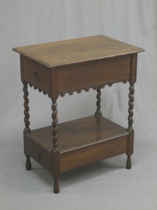 A rectangular oak 2 tier side table fitted a frieze drawer, raised on spiral turned supports the undertier also fitted a drawer 20"