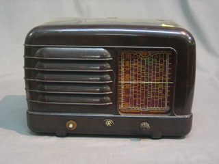 An FTC radio contained in a Bakelite case (hole to top)