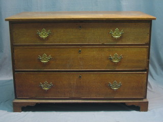 An 18th Century oak chest of 3 long drawers raised on bracket feet 46"