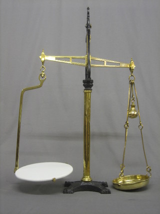 An impressive set of 19th Century polished brass and iron 7lb Avery scales 32"