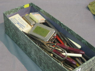 A collection of various curling tongs etc