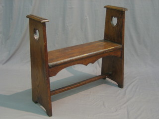 An Art Nouveau oak hall bench 31"