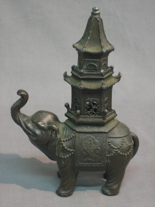 A pair of Eastern spelter Koro in the form of elephants 9"