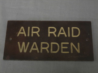 A WWII Bakelite sign - Air Raid Warden 6" x 3"