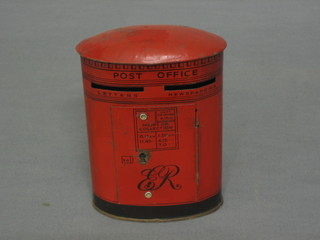 A Chad Valley money box in the form of a pillar box marked ER 3 1/2"