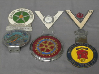 A Dorking League of Safe Drivers car badge, 2 veteran motor driver badges, an SG Club badge, a Rotary International car badge and an Old Ewellians Motor Association Badge