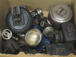 A collection of various old bicycle lamps
