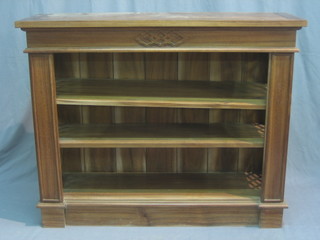 A Georgian style mahogany bookcase with adjustable shelves and fret work decoration to the sides 42" 