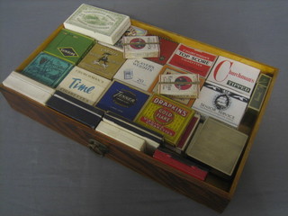 4 shallow wooden drawers containing a collection of old cigarette packets (some still full)