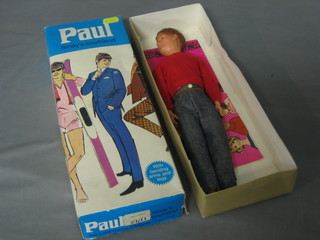 A figure of Paul, Sindy's boyfriend, boxed